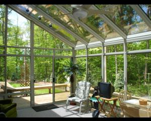 Cozy Four Season Sunroom Interior Interior view of a cozy Four Season Sunroom, perfect for year-round relaxation in Dallas, OR