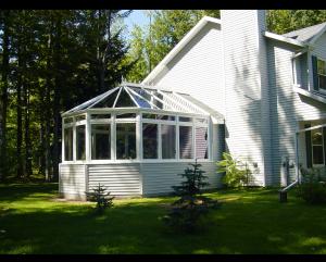 Exterior shot of a classic Georgian Conservatory installed by E&M Remodeling & Construction in Portland, OR