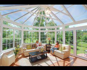 Inside a beautiful Victorian Conservatory, offering panoramic views and ample light in Salem, OR