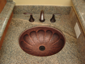 Modern bathroom sink installed during a complete remodel
